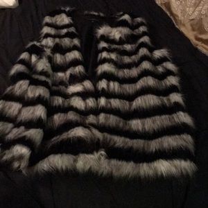 Black gray and white vest